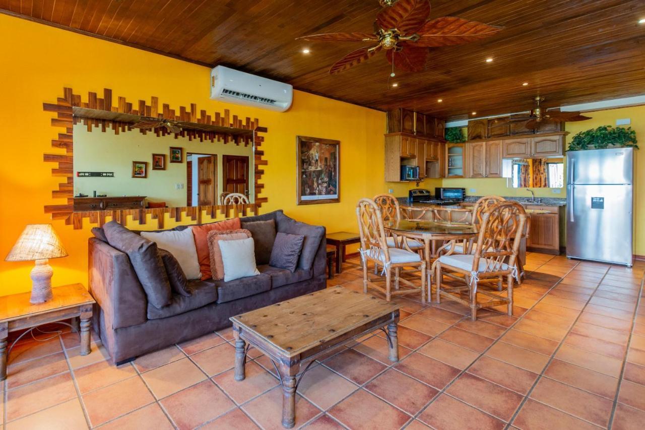 Warm Interiors And Orange Hues On Ground Floor In Front Of Beach Playa Flamingo Exterior photo