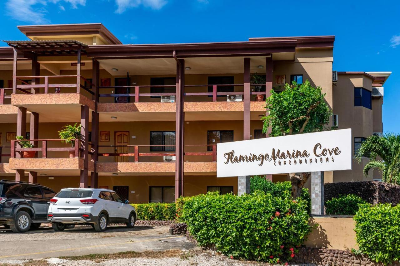Warm Interiors And Orange Hues On Ground Floor In Front Of Beach Playa Flamingo Exterior photo